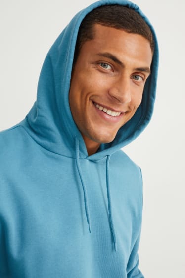 Home - Dessuadora amb caputxa - blau