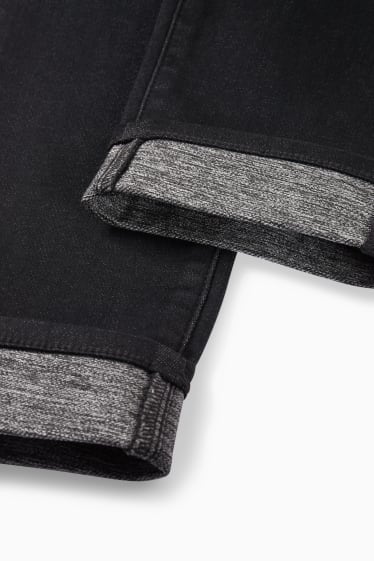 Kobiety - Slim jeans - dżinsy ocieplane - średni stan - czarny