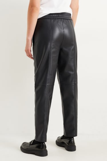 Women - Trousers - high-rise waist - tapered fit - faux leather - black