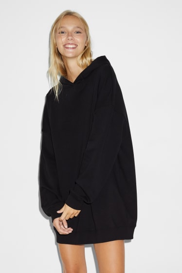 Dames - CLOCKHOUSE - jurk van sweatstof, met capuchon - zwart