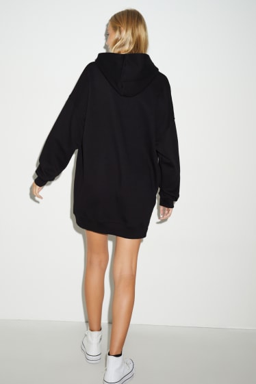 Dames - CLOCKHOUSE - jurk van sweatstof, met capuchon - zwart