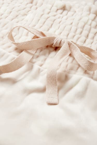 Kobiety - Ciążowe spodnie od piżamy na zimę - w kropki - jasnoszary