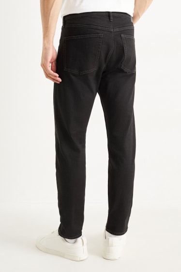 Men - Slim tapered jeans - black