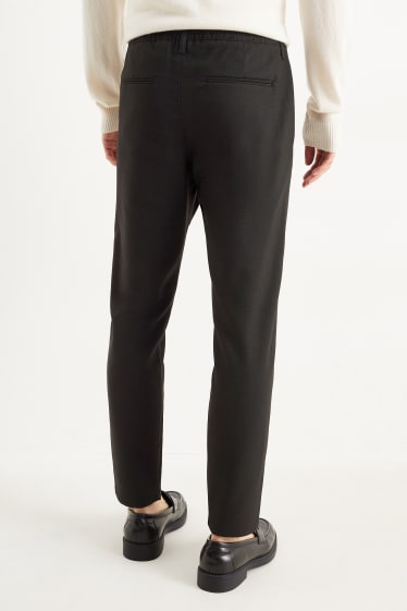 Uomo - Pantaloni chino - tapered fit - nero