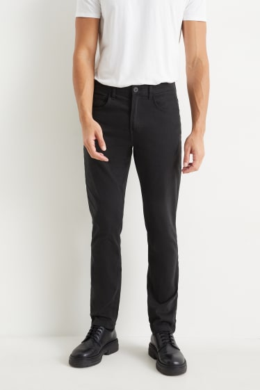 Uomo - Pantaloni - slim fit - Flex - nero