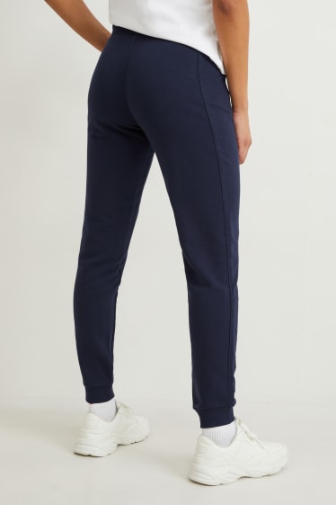 Dona - Pantalons de xandall tècnics - blau fosc