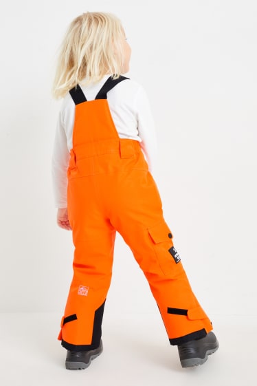 Dětské - Lyžařské kalhoty - tmavě oranžová