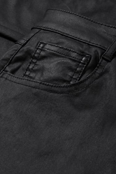 Nastolatki - CLOCKHOUSE - spodnie materiałowe - średni stan - skinny fit - czarny