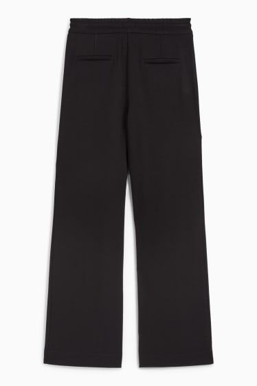 Donna - Pantaloni in jersey - gamba ampia - nero