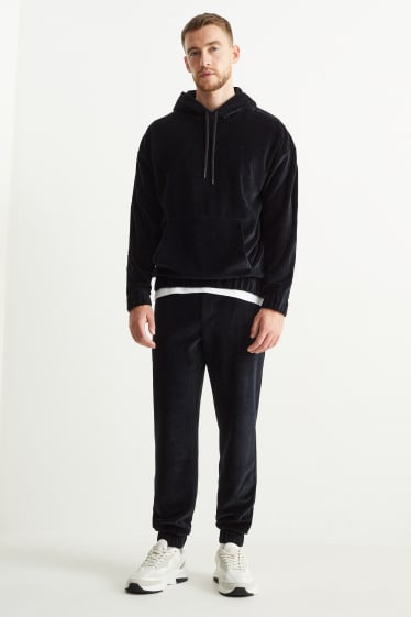 Hommes - Pantalon de jogging en velours - noir