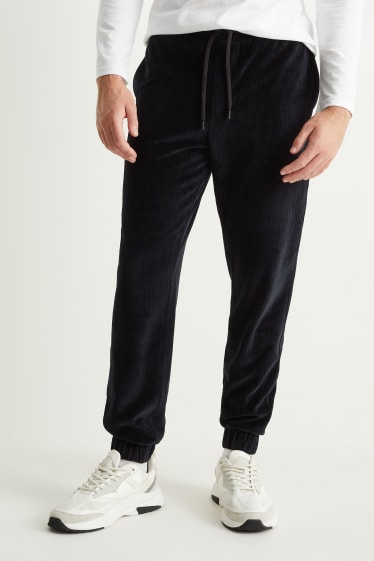 Hommes - Pantalon de jogging en velours - noir