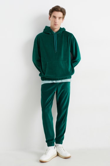 Herren - Samt-Jogginghose - dunkelgrün