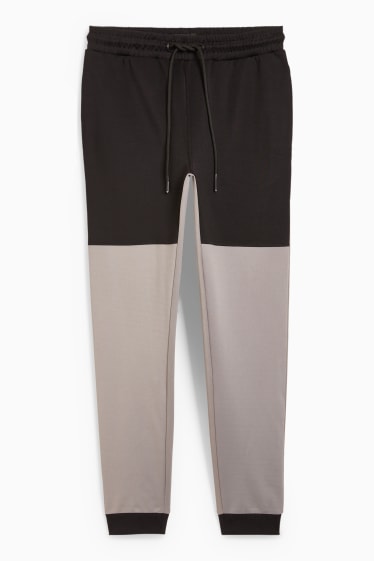 Uomo - Pantaloni sportivi - grigio