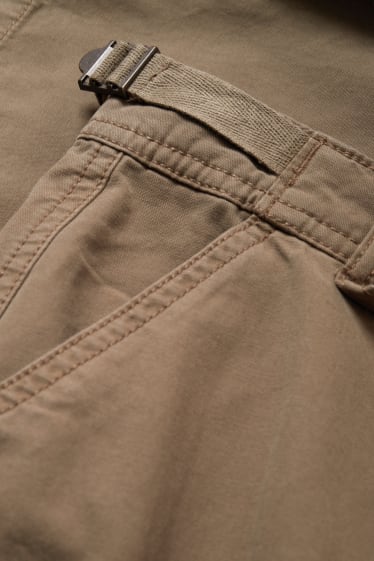 Nastolatki - CLOCKHOUSE - spodnie materiałowe - średni stan - straight fit - kaki