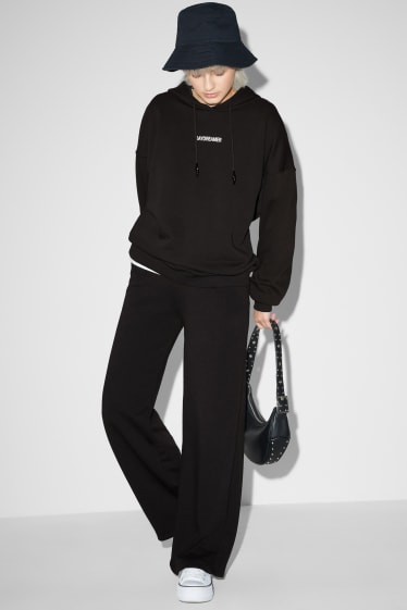 Dona - CLOCKHOUSE - pantalons de xandall - negre