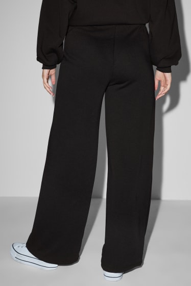 Dona - CLOCKHOUSE - pantalons de xandall - negre
