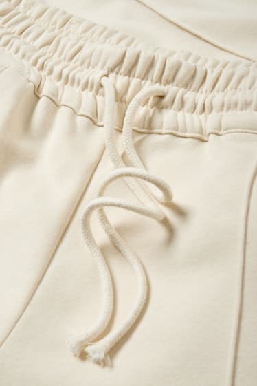 Femei - Pantaloni din jerseu - talie medie - wide leg - bej deschis