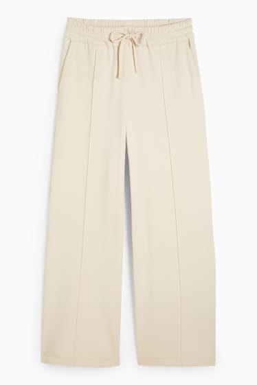 Donna - Pantaloni di jersey - vita media - gamba ampia - beige chiaro