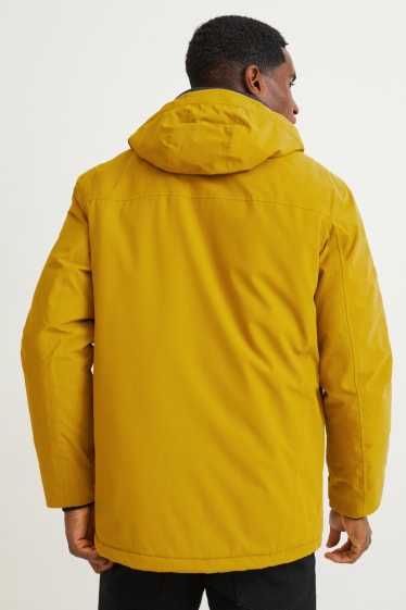 Heren - Regenjas met capuchon - waterdicht - mosterdgeel