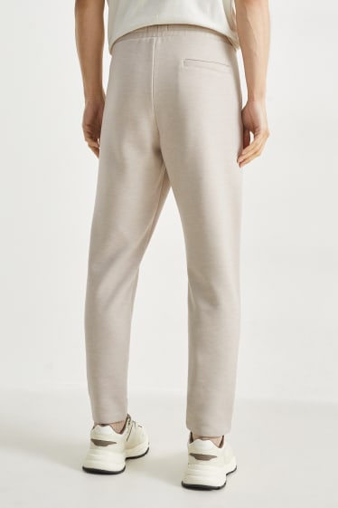 Uomo - Pantaloni sportivi - beige