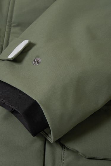 Dona - Jaqueta impermeable amb caputxa - verd