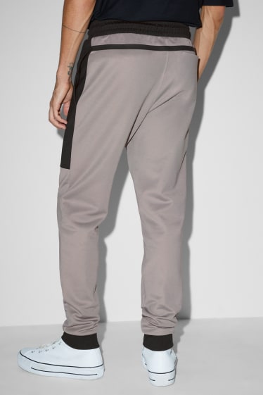 Uomo - Pantaloni sportivi - grigio