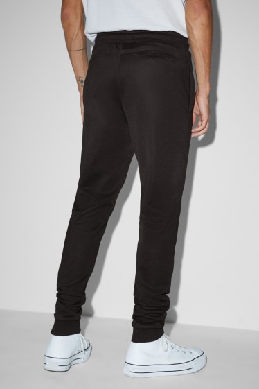 Hommes - Pantalon de jogging - noir