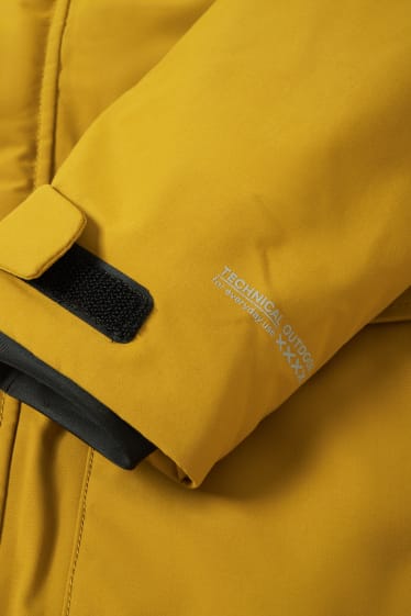 Heren - Regenjas met capuchon - waterdicht - mosterdgeel
