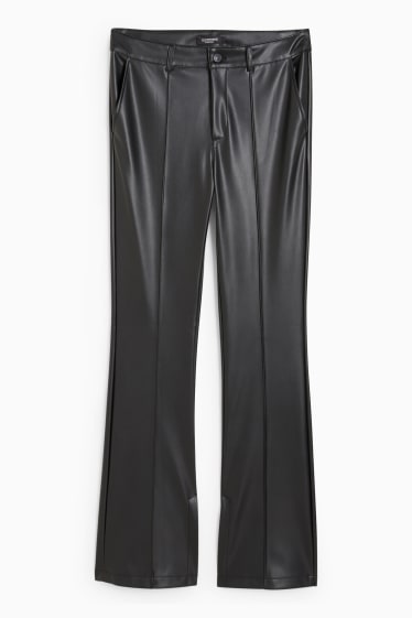 Dona - Pantalons - mid waist - bootcut fit - pell sintètica - negre