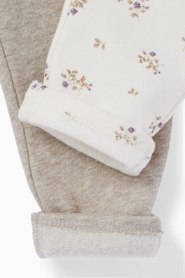 Baby: meisjes - Set van 2 - bloemetjes - baby-joggingbroek - thermobroek - beige