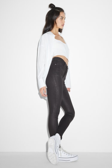 Jóvenes - CLOCKHOUSE - skinny jeans - mid waist - LYCRA® - negro