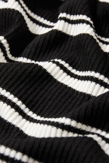 Adolescenți și tineri - CLOCKHOUSE - fustă din tricot - cu dungi - negru