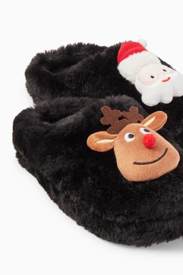 Femmes - CLOCKHOUSE - chaussons de Noël en imitation fourrure - noir