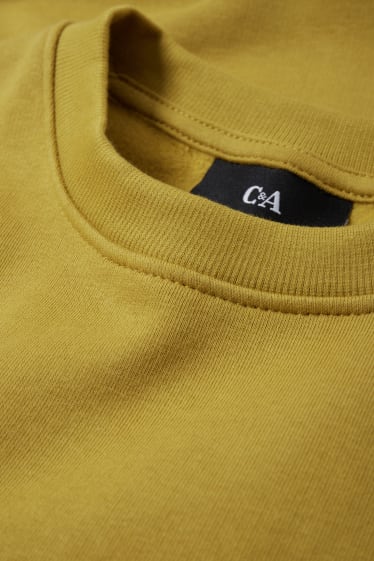 Home - Dessuadora - groc mostassa