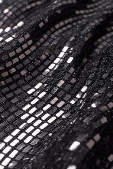 Ados & jeunes adultes - CLOCKHOUSE - robe Fit & Flare avec un petit nœud - matière brillante - noir