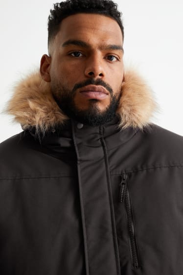 Hommes - Veste avec capuche et garniture en imitation fourrure - noir