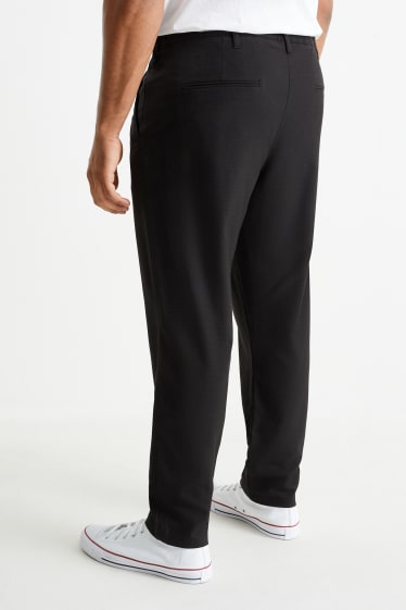 Uomo - Pantaloni chino - tapered fit - nero