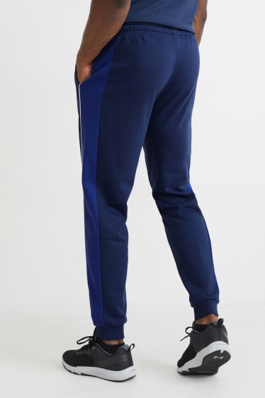 Hommes - Pantalon de jogging - bleu foncé