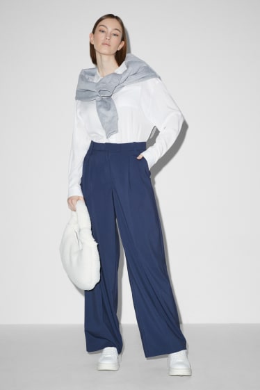 Joves - CLOCKHOUSE - pantalons de tela - mid waist - wide leg - blau fosc