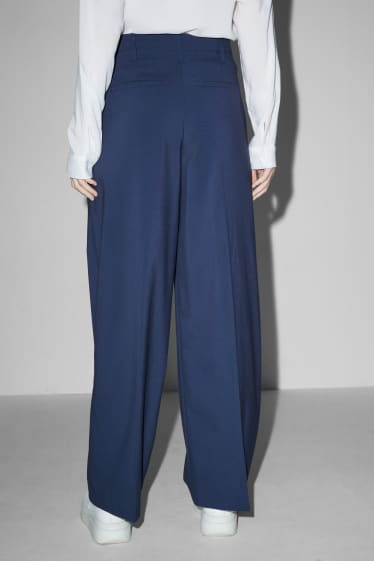 Joves - CLOCKHOUSE - pantalons de tela - mid waist - wide leg - blau fosc