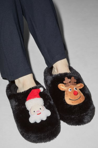 Femmes - CLOCKHOUSE - chaussons de Noël en imitation fourrure - noir