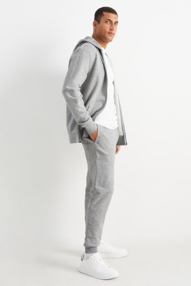 Pánské - Teplákové kalhoty - světle šedá-žíhaná