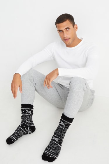 Unisex - Calzini natalizi antiscivolo - fiocchi di neve - nero