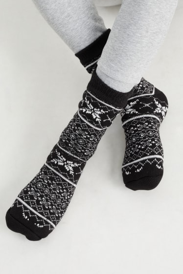 Unisex - Calzini natalizi antiscivolo - fiocchi di neve - nero