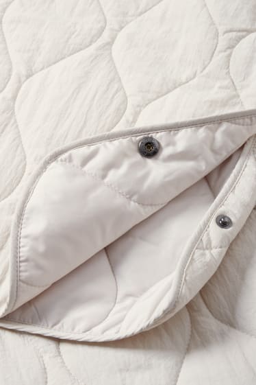 Dámské - Prošívaný kabát - krémově bílá