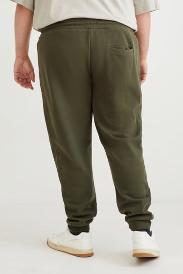 Uomo - Pantaloni sportivi - verde scuro