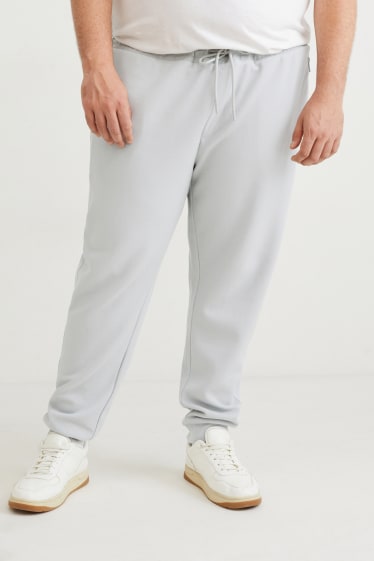 Uomo - Pantaloni sportivi - grigio chiaro