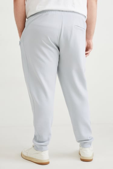 Pánské - Teplákové kalhoty - světle šedá