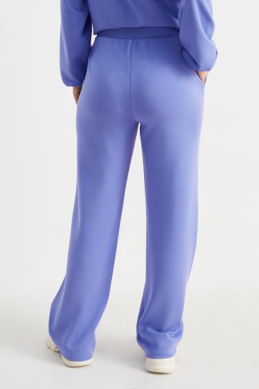 Dámské - Teplákové kalhoty basic - fialová