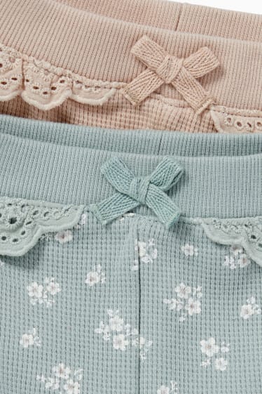 Baby: meisjes - Set van 2 - bloemetjes - babyjoggingbroek - mintgroen